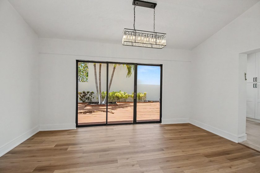 This beautifully updated 3-bedroom, 2-bathroom residence offers - photo 23