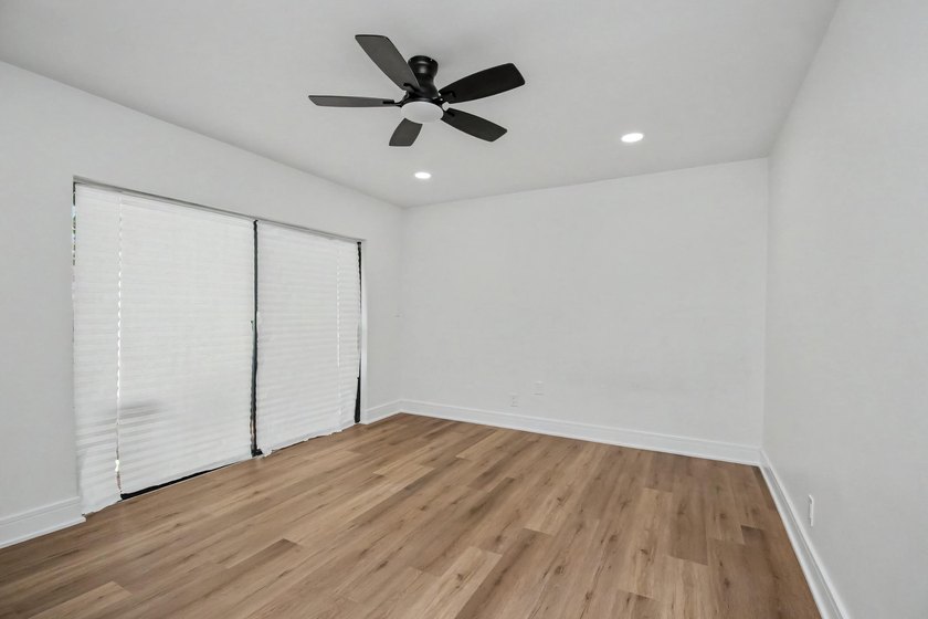 This beautifully updated 3-bedroom, 2-bathroom residence offers - photo 32