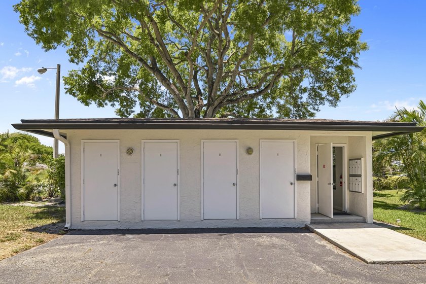 Welcome to this charming one-bedroom, one-bathroom condominium - photo 32