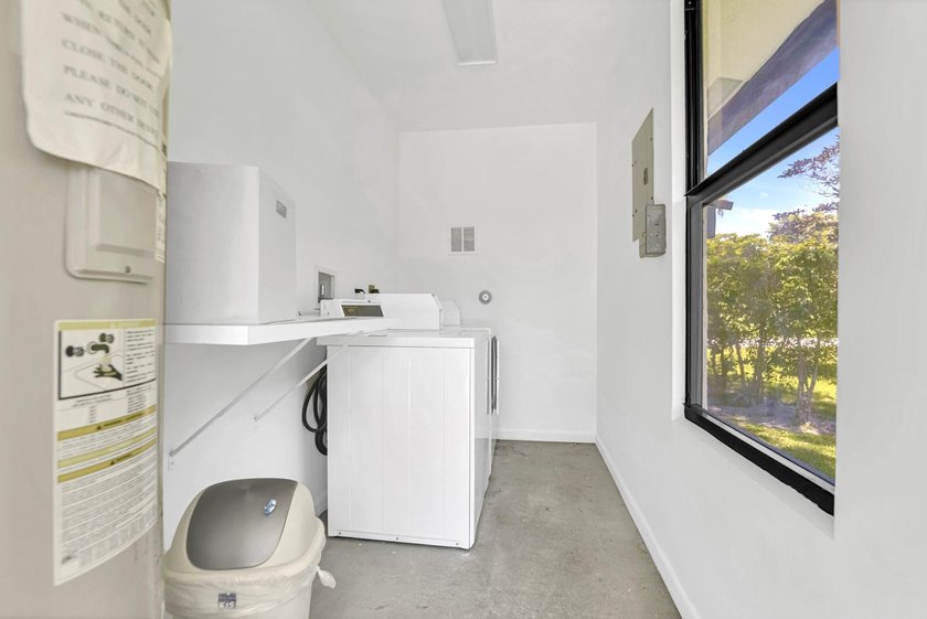 Welcome to this charming one-bedroom, one-bathroom condominium - photo 33