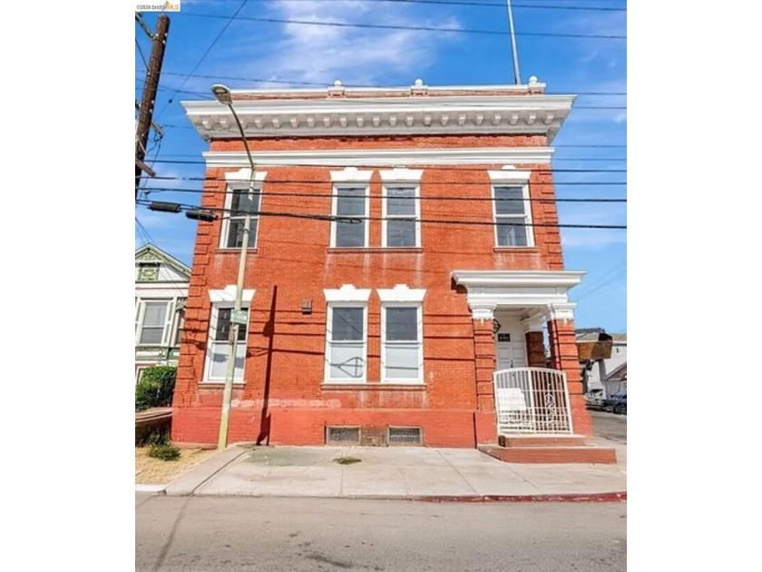 This two-story commercial property, built in 1906, offers 5,600 - photo 5