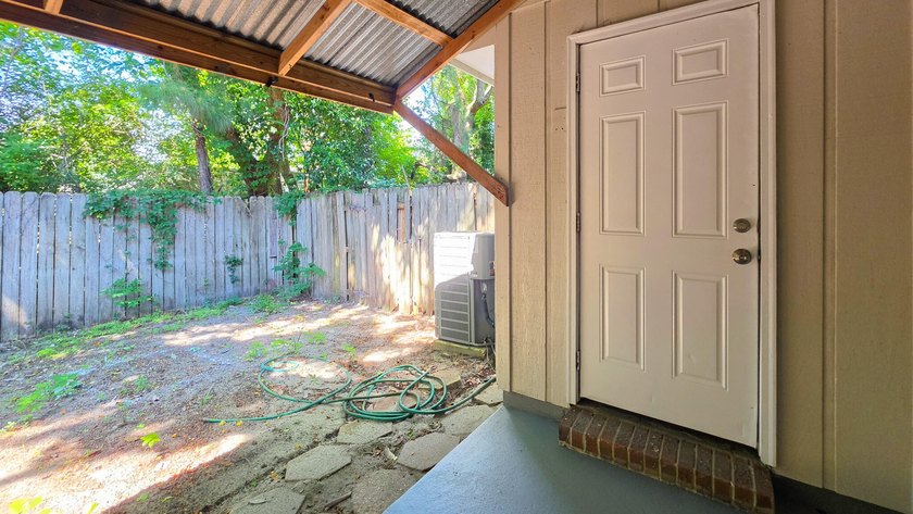 Freshly updated townhome, WITH A BRAND NEW ROOF in 2026. This - photo 17