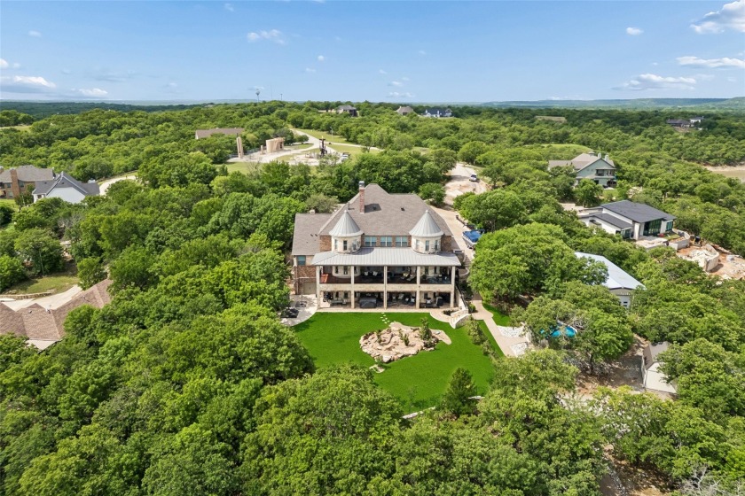 Waterfront views take center stage in this exceptional estate - photo 3