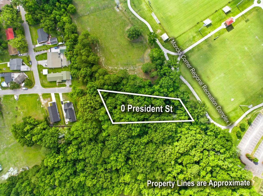 Discover .81 acres of wooded privacy at the end of President - photo 3