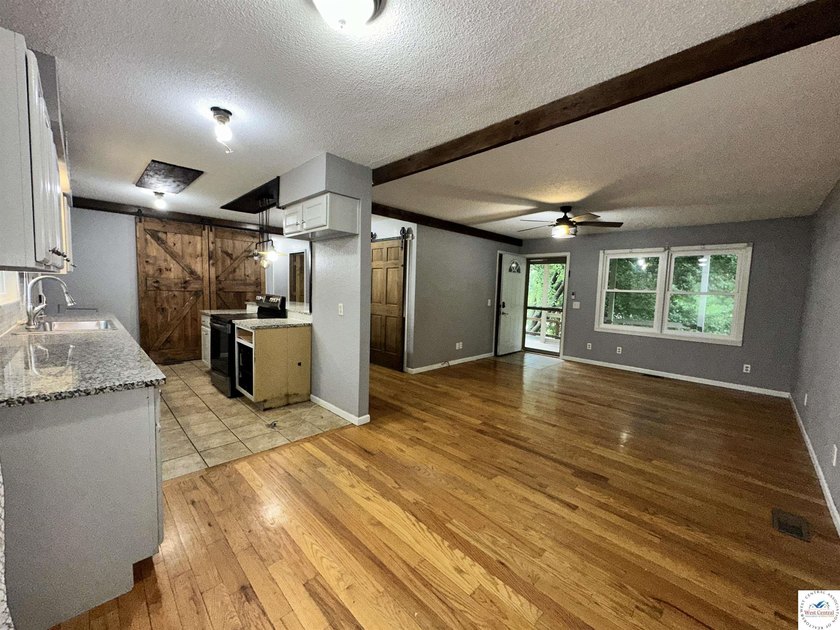 4-bed, 2-bath home in Warsaw featuring an open floor plan - photo 12