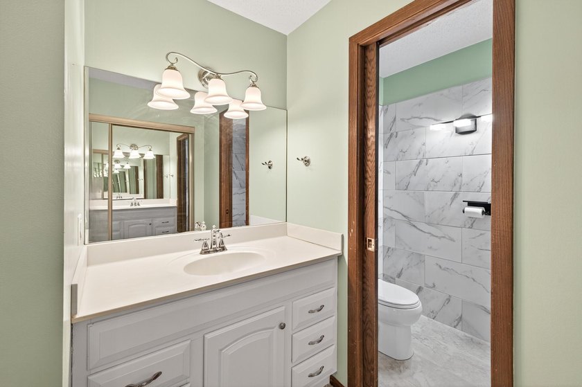 Experience comfortable, low-maintenance living in this - photo 11