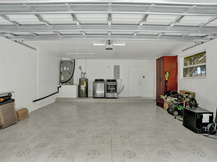 Welcome to 2401 NW 39th St! Situated in the highly sought-after - photo 49