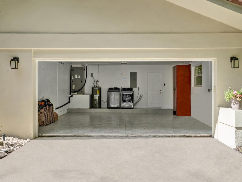 Welcome to 2401 NW 39th St! Situated in the highly sought-after - photo 50