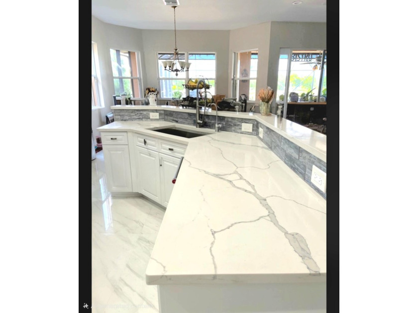 Welcome to one of the most impressive lakefront properties in - photo 4