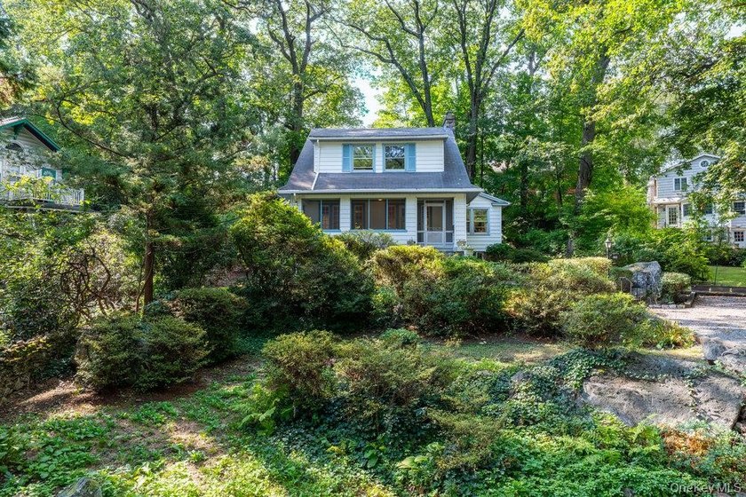 Classic Colonial Charm in a Picturesque warmth of Village Life! - photo 2