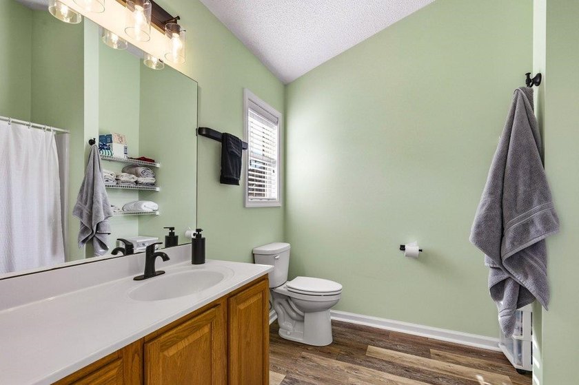 Discover this beautifully updated 3-bedroom, 3-bath - photo 22