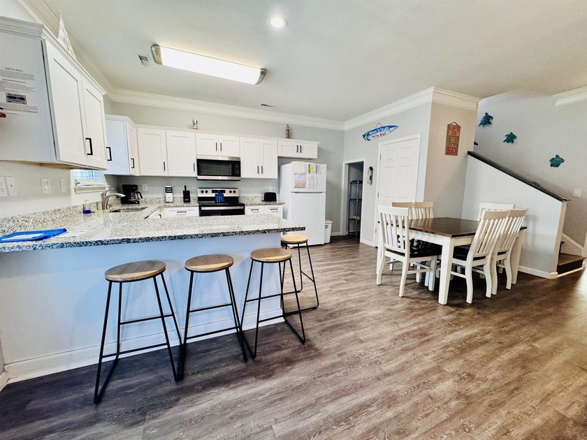EXCELLENT INVESTMENT! RARE 7 BEDROOM OCEAN VIEW RAISED BEACH - photo 14