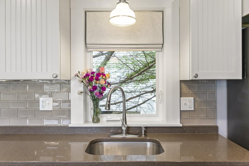 This charming downtown bungalow can't wait to meet you! With - photo 21