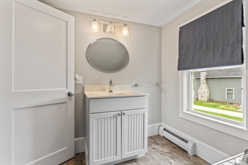 This charming downtown bungalow can't wait to meet you! With - photo 36