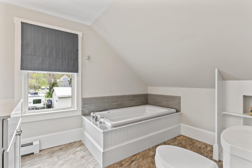 This charming downtown bungalow can't wait to meet you! With - photo 37