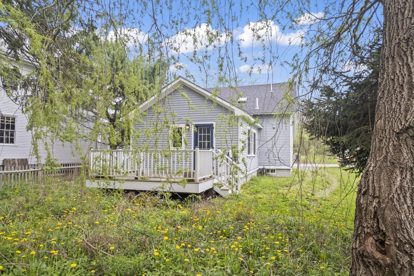 This charming downtown bungalow can't wait to meet you! With - photo 45