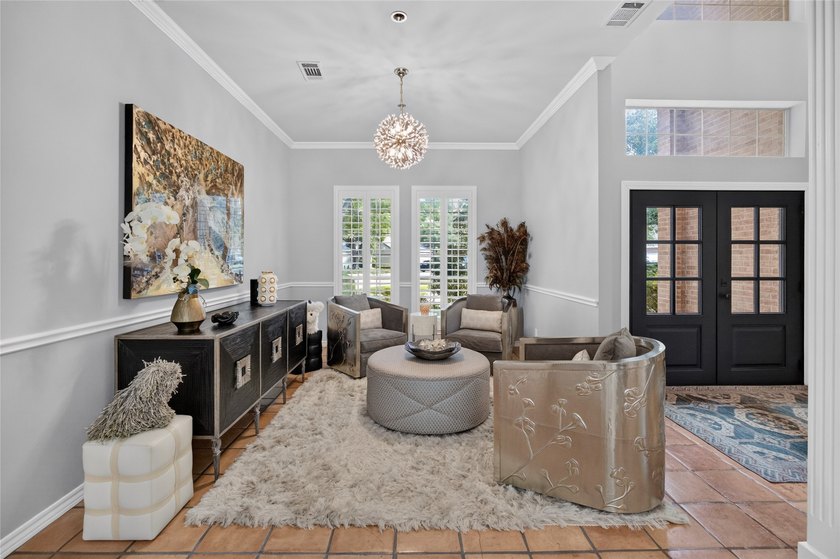 Nestled beneath mature shade trees in the prestigious gated - photo 5