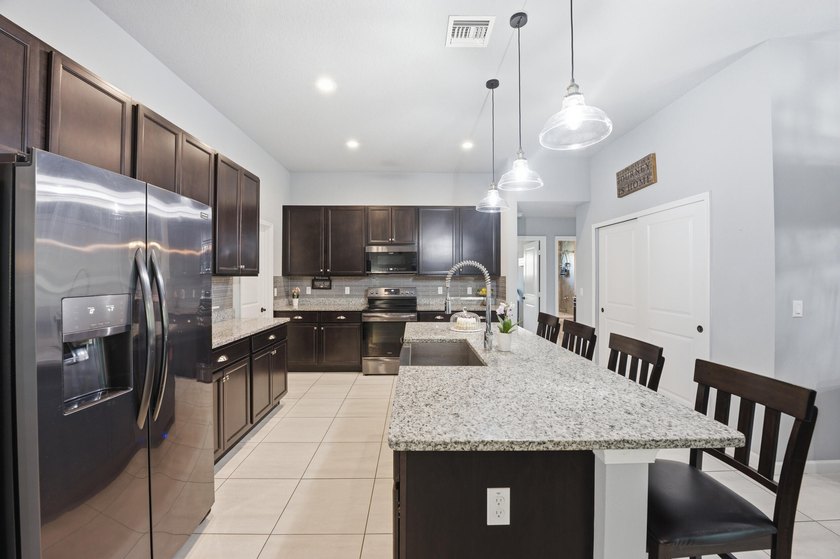 Discover this beautifully designed 3-bedroom, 3-bath home with a - photo 13