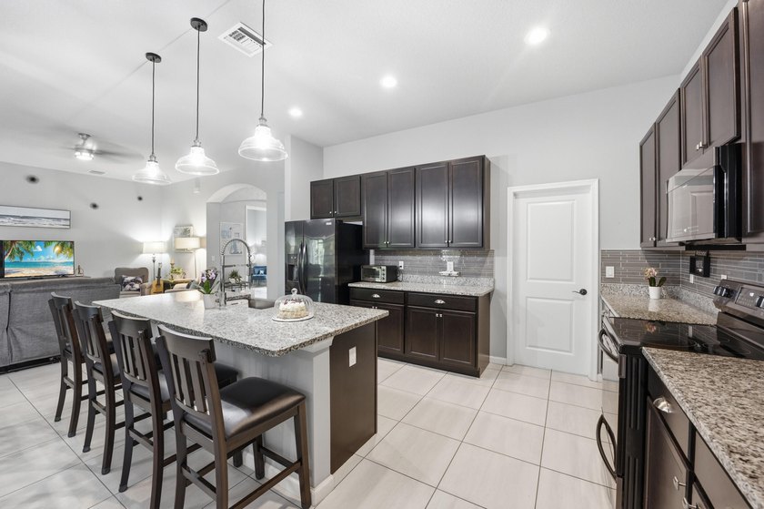 Discover this beautifully designed 3-bedroom, 3-bath home with a - photo 15