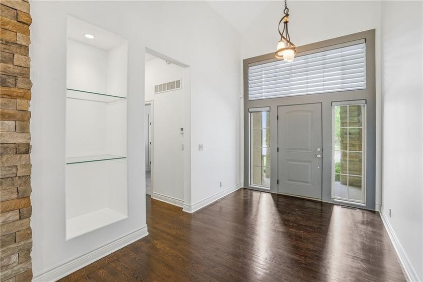 Welcome home to this beautifully designed reverse 1.5-story - photo 3