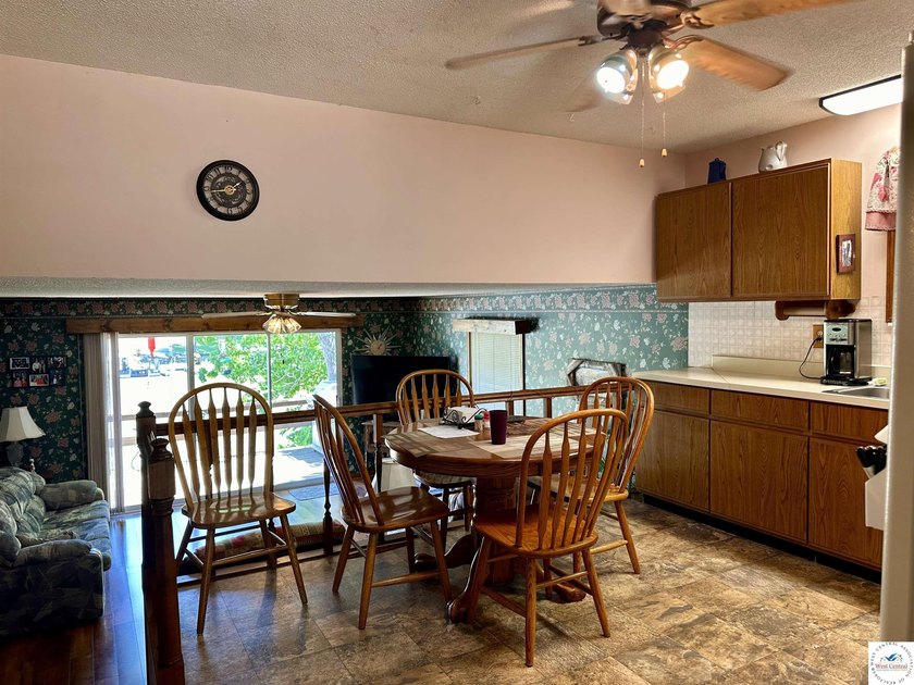 Located on a quiet cove on the Lake of the Ozarks in a very - photo 15