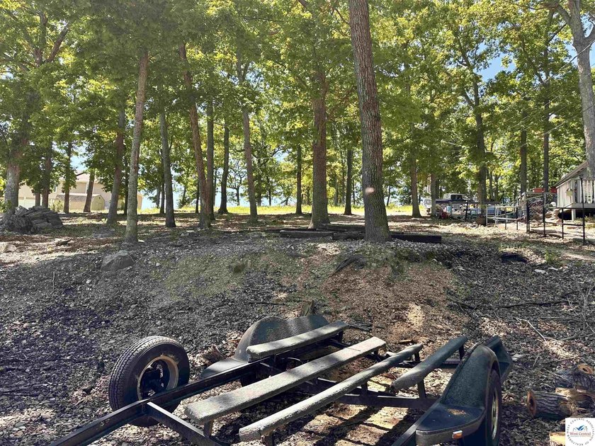 Located on a quiet cove on the Lake of the Ozarks in a very - photo 28