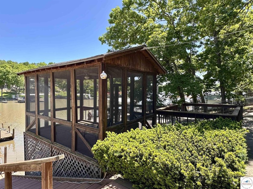 Located on a quiet cove on the Lake of the Ozarks in a very - photo 33