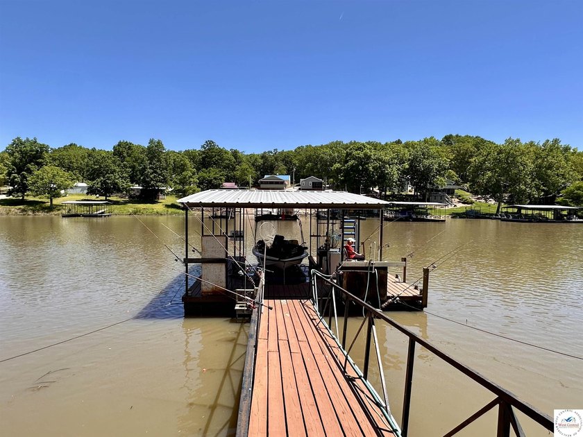 Located on a quiet cove on the Lake of the Ozarks in a very - photo 34