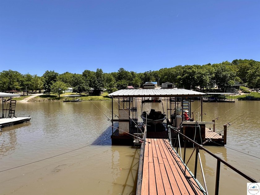 Located on a quiet cove on the Lake of the Ozarks in a very - photo 36