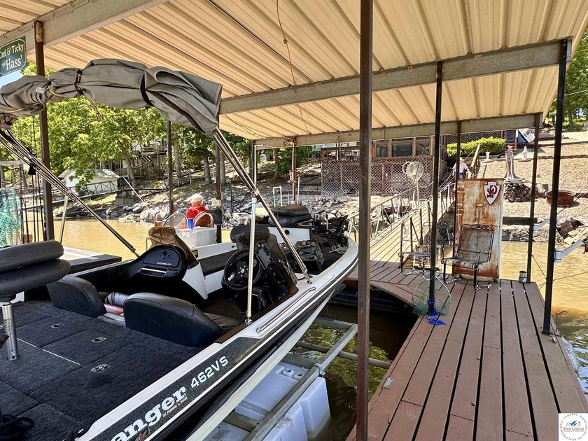 Located on a quiet cove on the Lake of the Ozarks in a very - photo 38