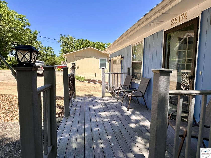 Located on a quiet cove on the Lake of the Ozarks in a very - photo 42