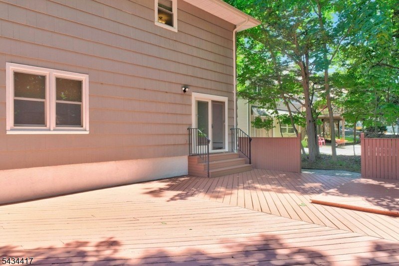 Welcome to Packanack Lake, where lifestyle meets location! This - photo 5