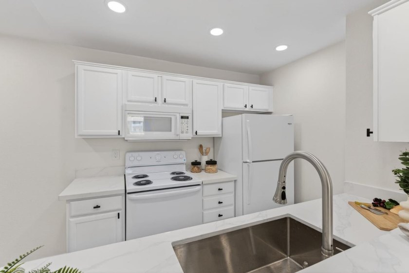 The condo has just been fully remodeled with a newly updated - photo 11