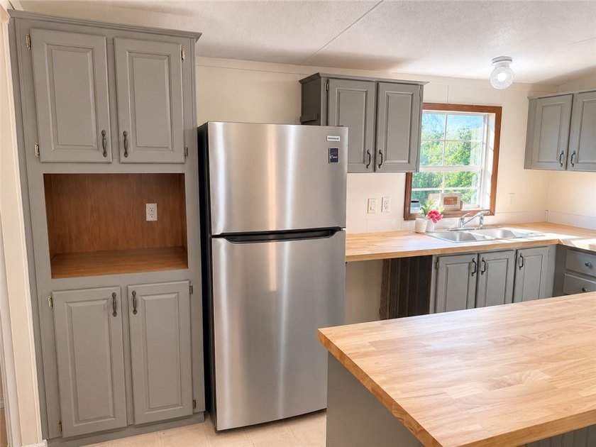 Move-in ready and extensively updated in 2026, this charming - photo 11