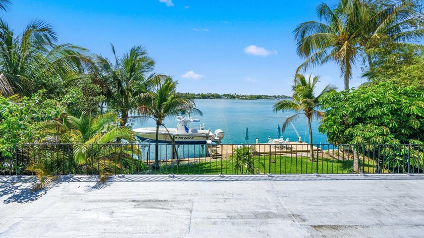 Discover Your Hidden Paradise! This charming riverfront property - photo 11