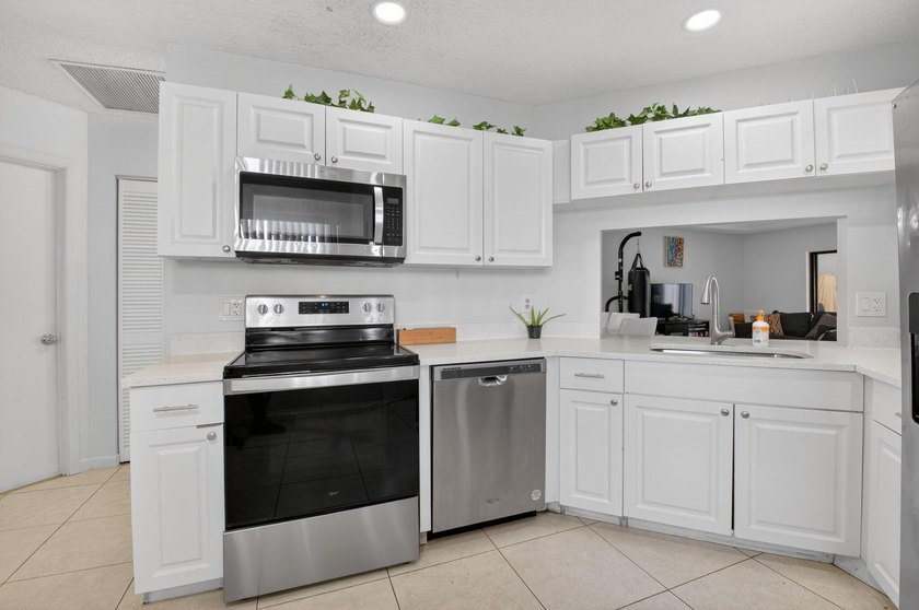 This beautifully renovated 3-bedroom, 2-bath home is tucked away - photo 14