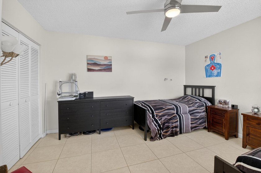 This beautifully renovated 3-bedroom, 2-bath home is tucked away - photo 20