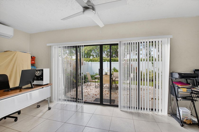 This beautifully renovated 3-bedroom, 2-bath home is tucked away - photo 26