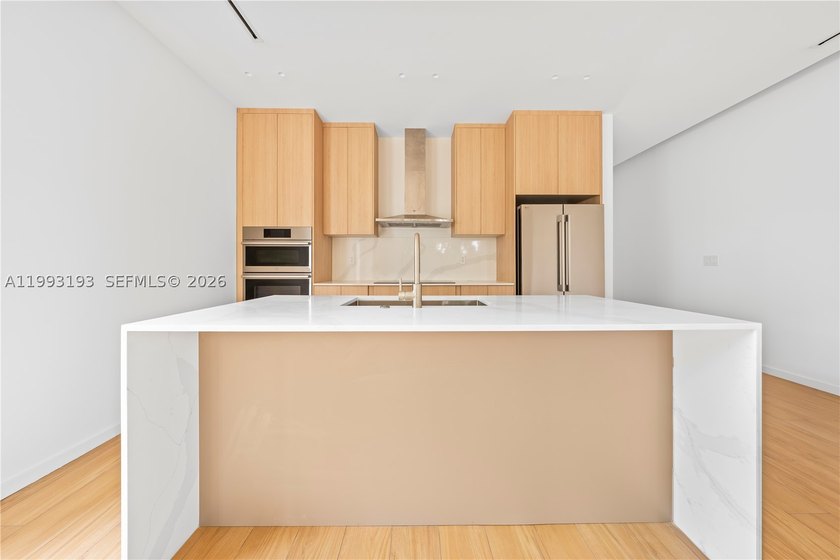 Stunning new construction three-story townhouse offering refined - photo 11