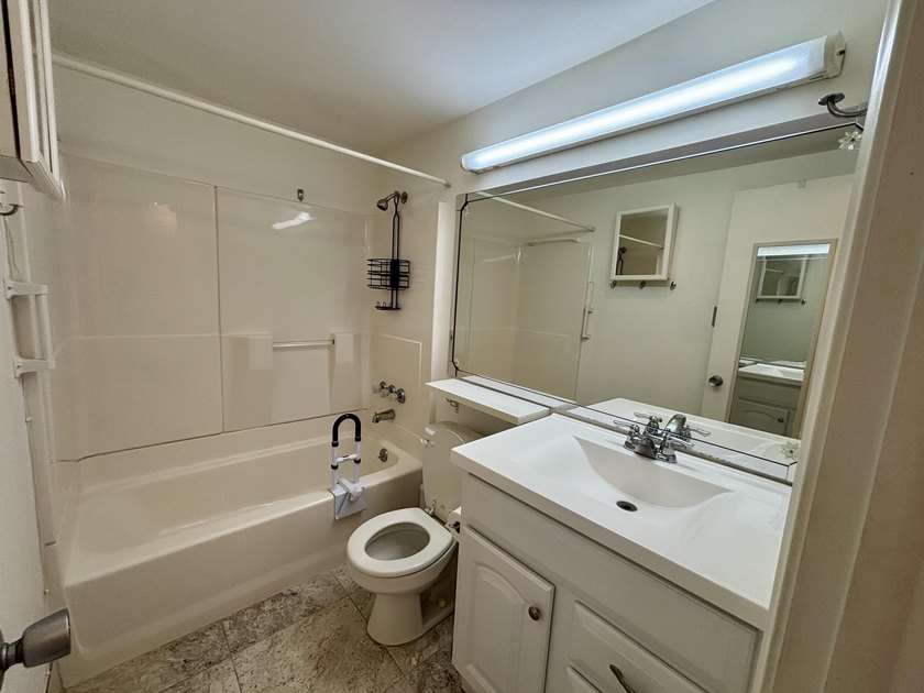 Welcome to this one-bedroom, one-bathroom condominium in the - photo 17