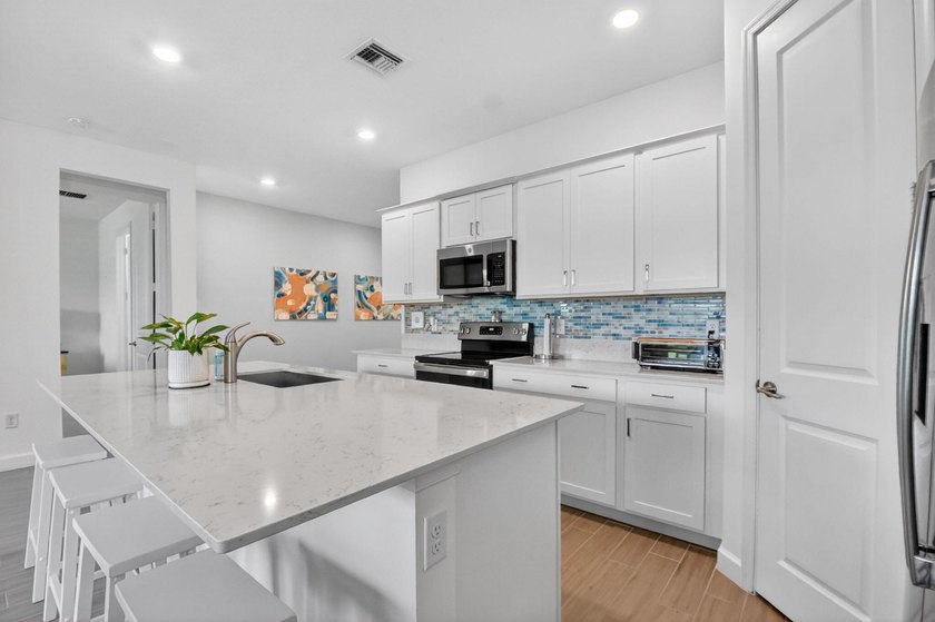 This practically new home has been wonderfully updated and - photo 14
