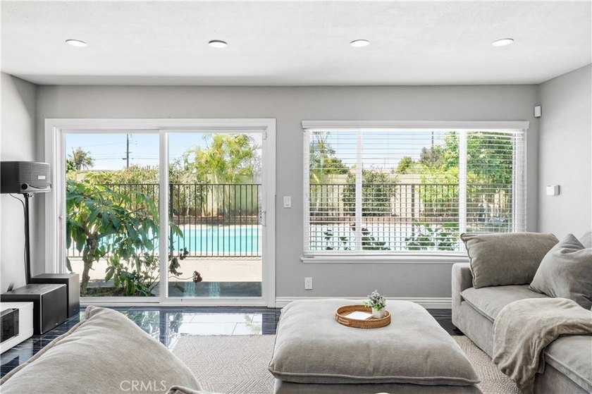 A home with room to live, work, gather, and unwind. Located at - photo 5