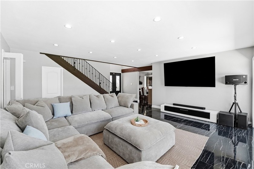 A home with room to live, work, gather, and unwind. Located at - photo 7
