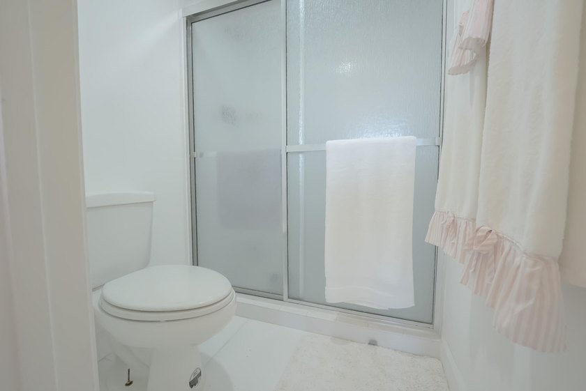Brand new AC and HWH, 11/2025. Welcome to one of North Palm - photo 14