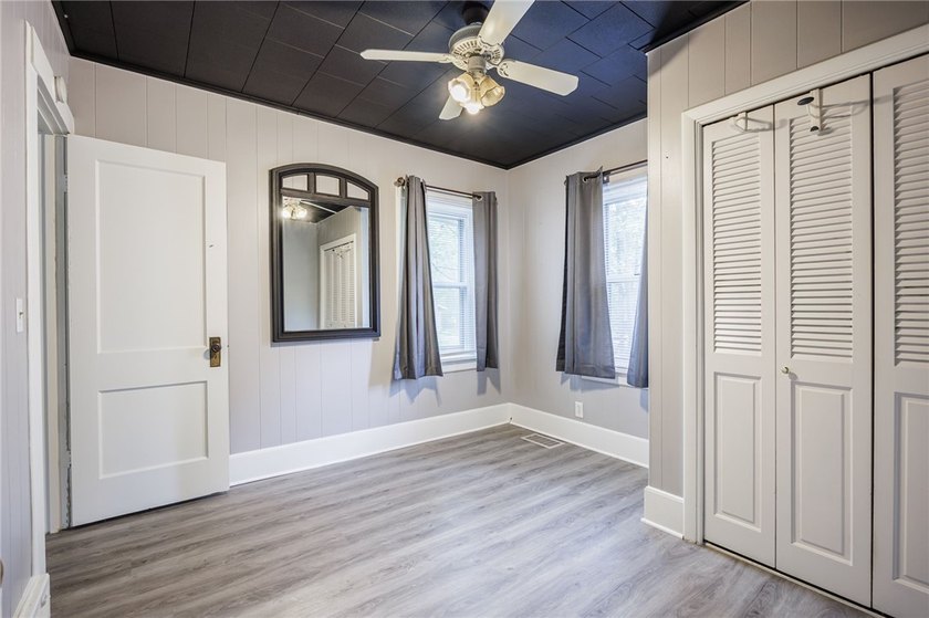 This charming home is nestled in Rochester's beloved Charlotte - photo 12