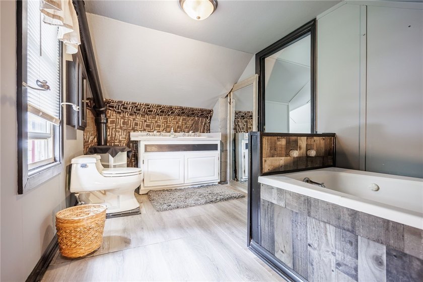 This charming home is nestled in Rochester's beloved Charlotte - photo 16