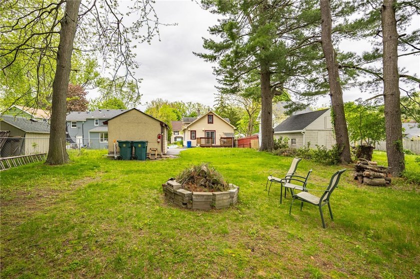 This charming home is nestled in Rochester's beloved Charlotte - photo 19