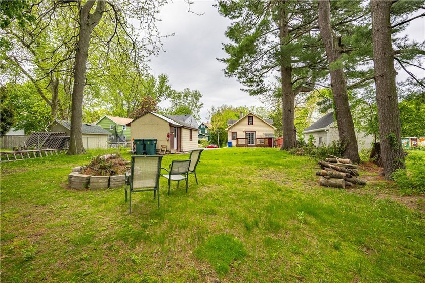 This charming home is nestled in Rochester's beloved Charlotte - photo 20