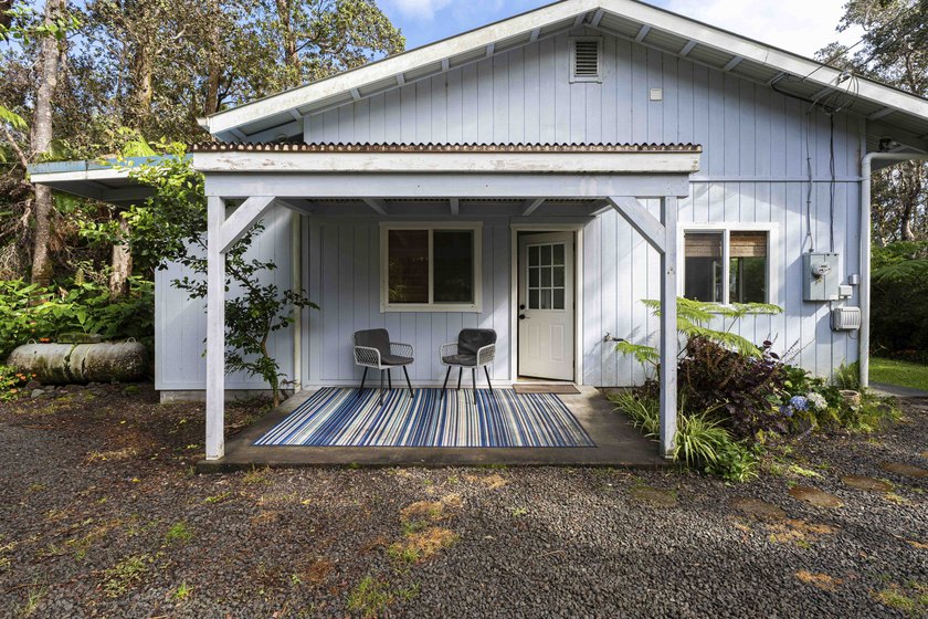 Nestled among lush hapuu ferns, majestic Ohia Lehua trees, and - photo 2