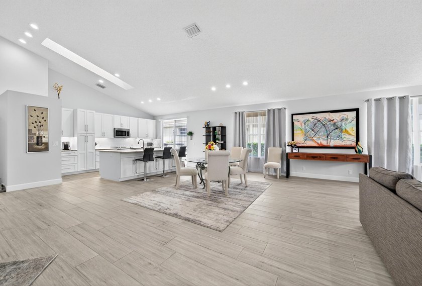 Welcome to Eastpointe Country Club. This large family home sits - photo 6